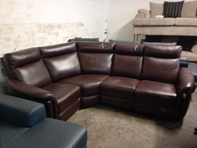 Burgundy leather corner sofa with power recliners