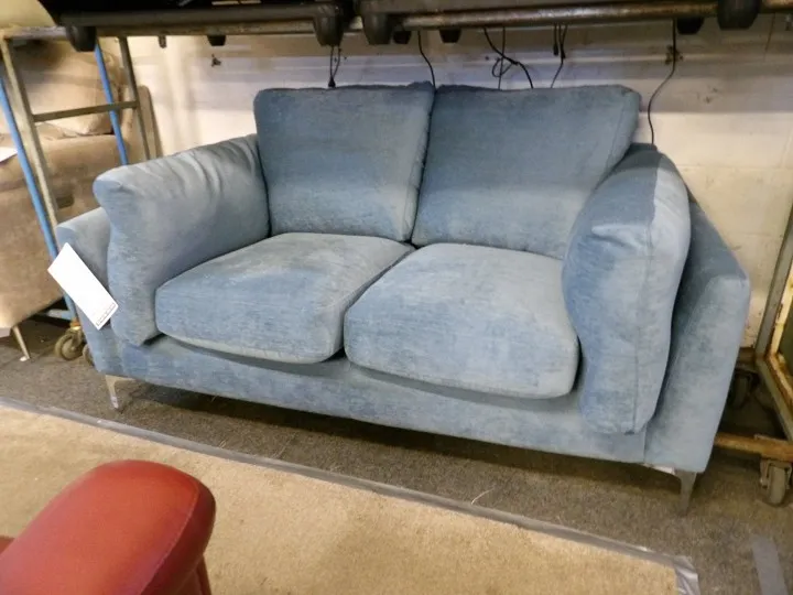Blue fabric 2 seater sofa with supportive back cushions and slim metal legs