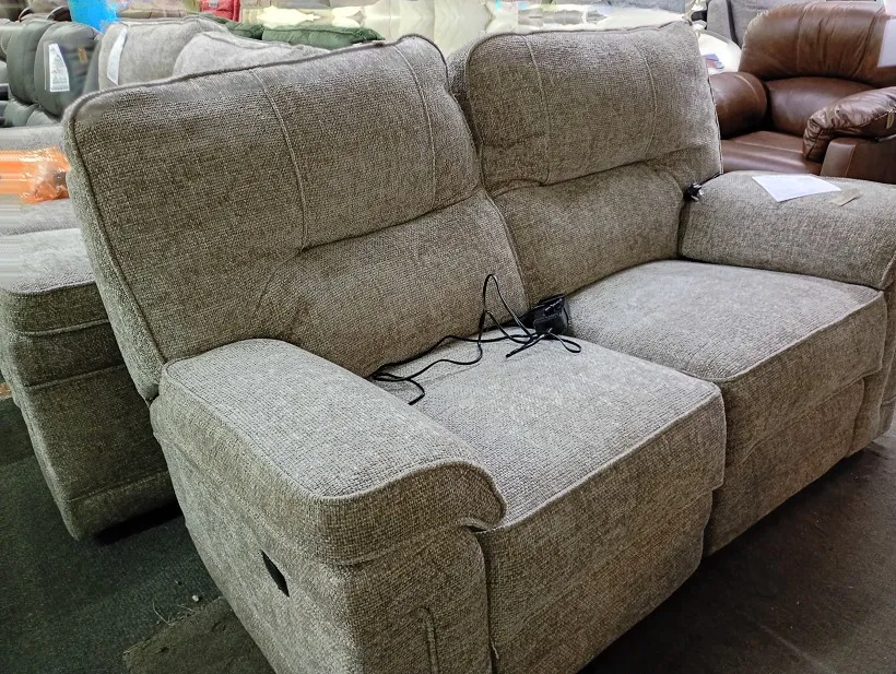 Grey textured weave fabric 2 seater sofa with electric recliner mechanism and cables visible