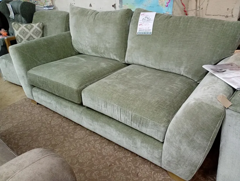 Sage green textured fabric 3 seater sofa with loose pillow back cushions and wooden feet