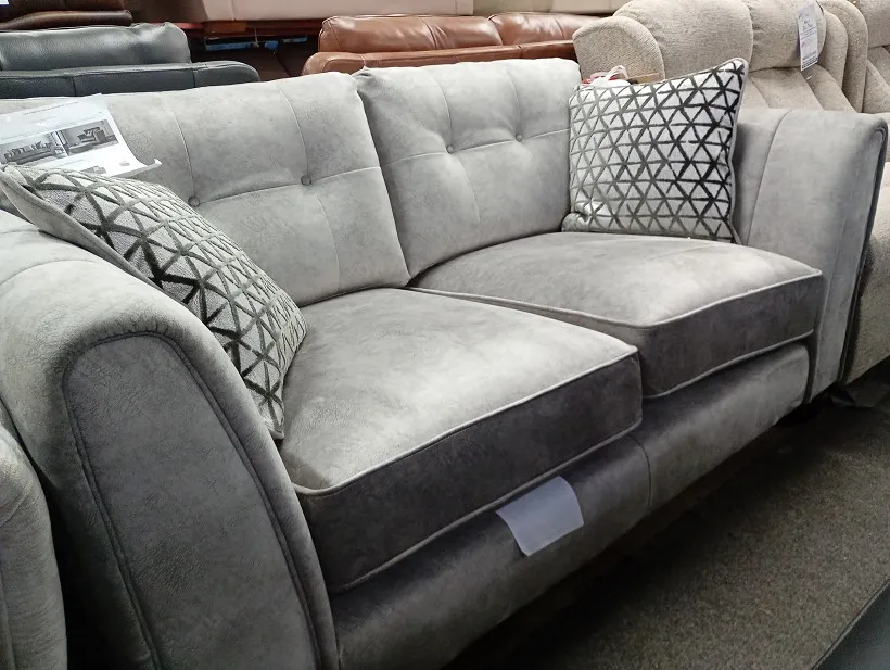 Grey textured fabric 3 seater sofa with buttoned back cushions and geometric scatter cushions