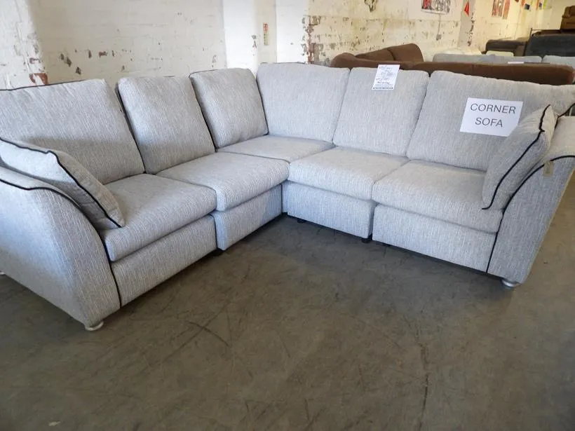 Light grey fabric corner sofa with deep seating