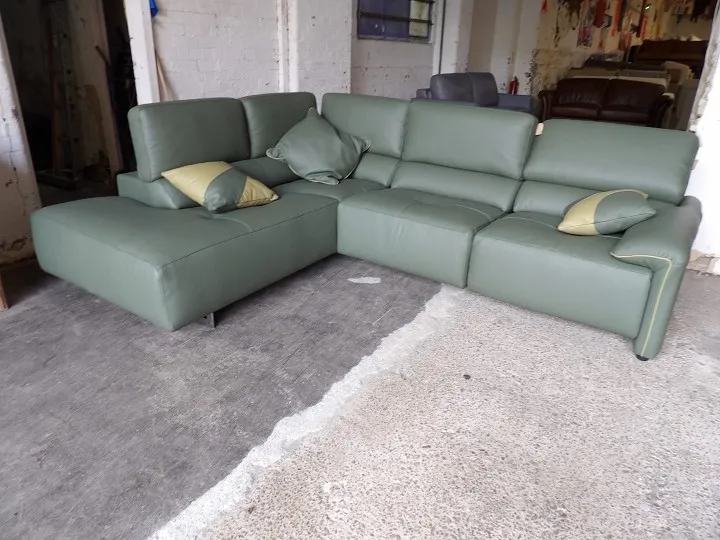 Modern green corner sofa with chaise seating